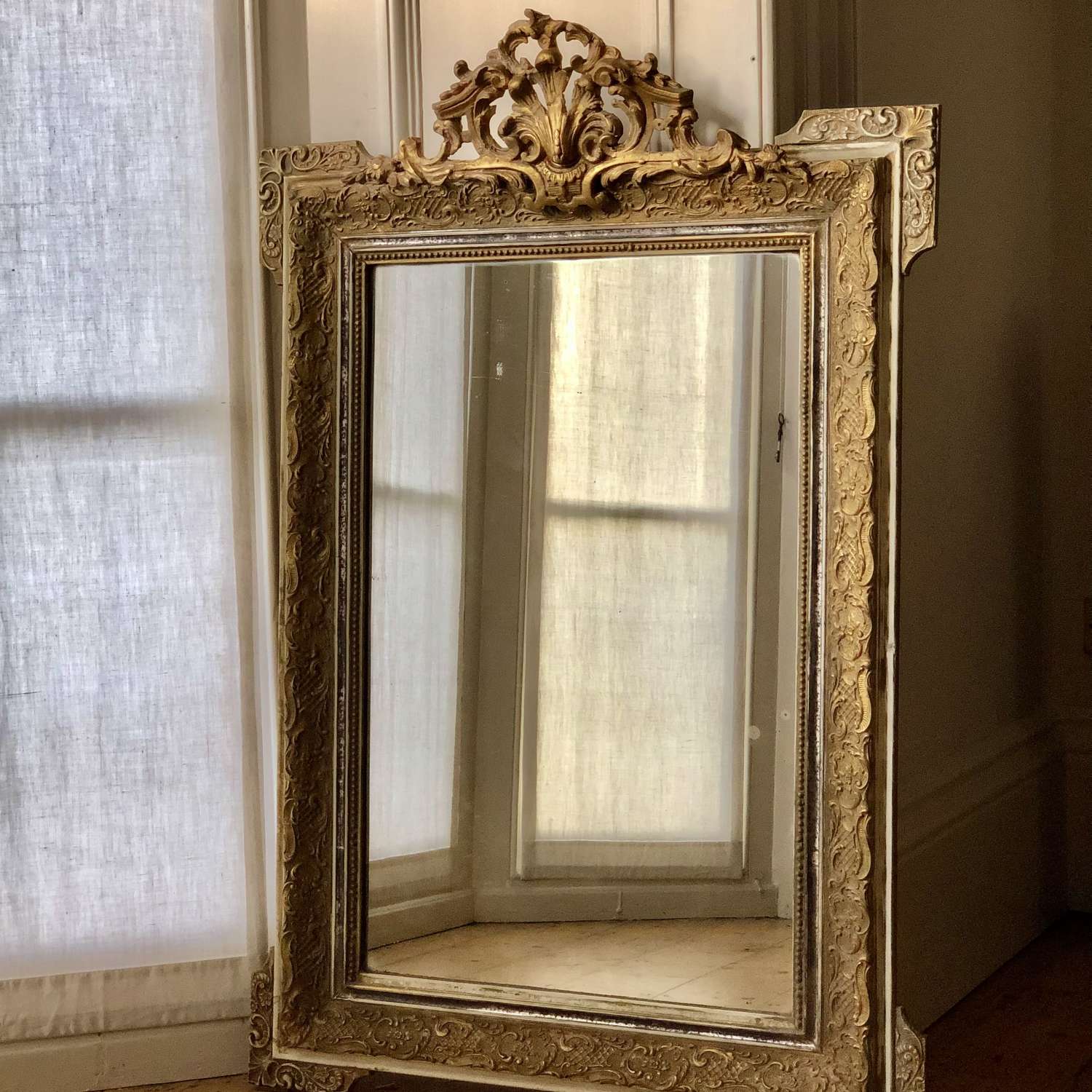 Antique French gilt crested mirror