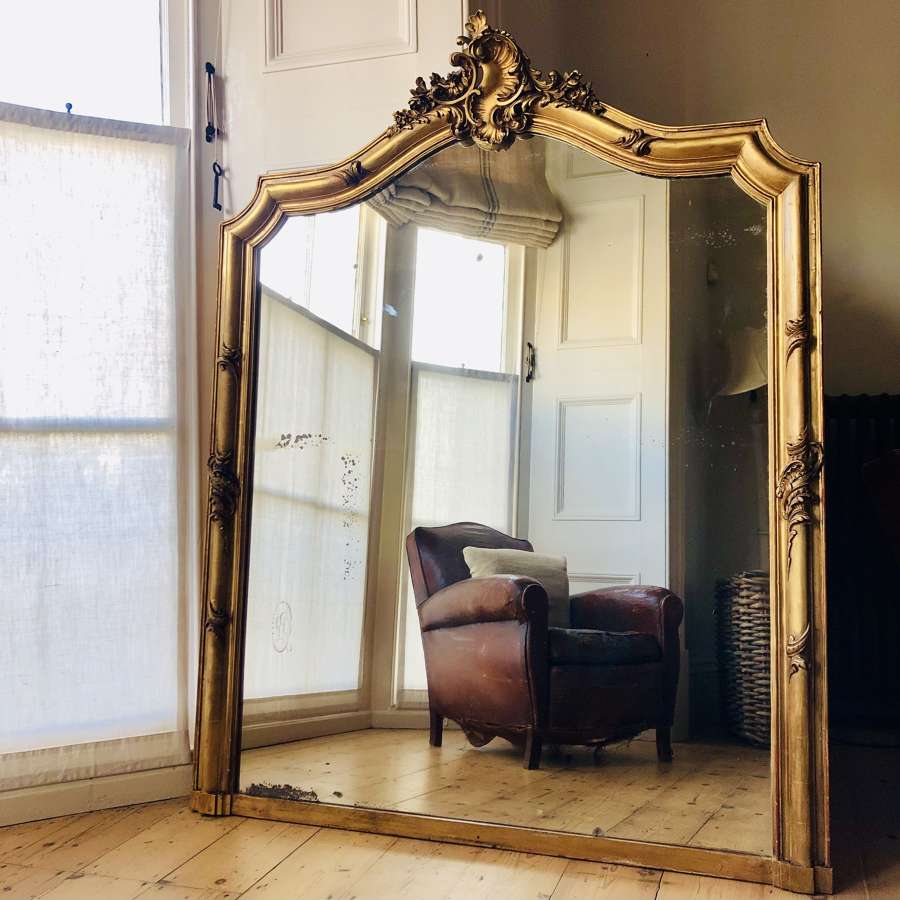 Large antique French gilt Louis XV leaner mirror overmantel