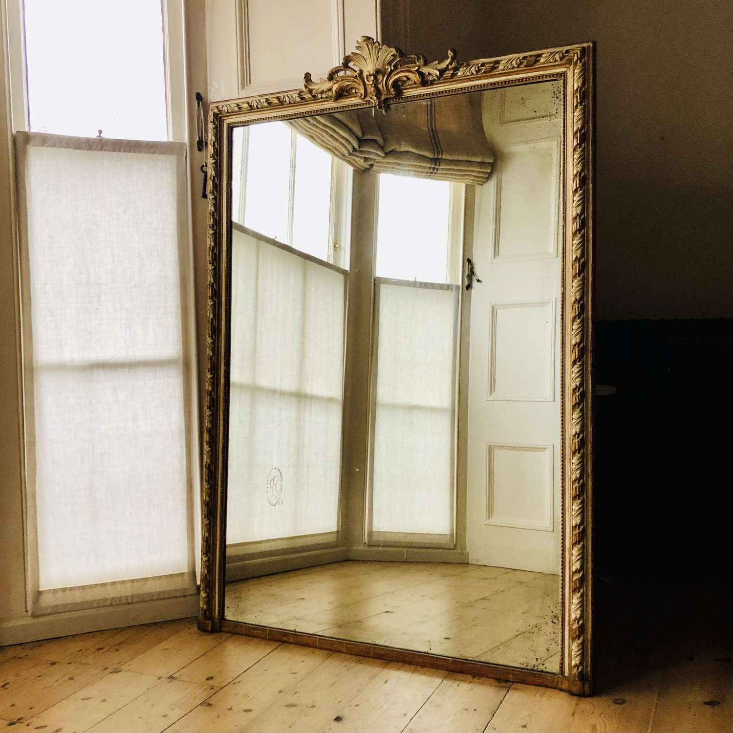 Antique French gilt and gesso leaner mirror