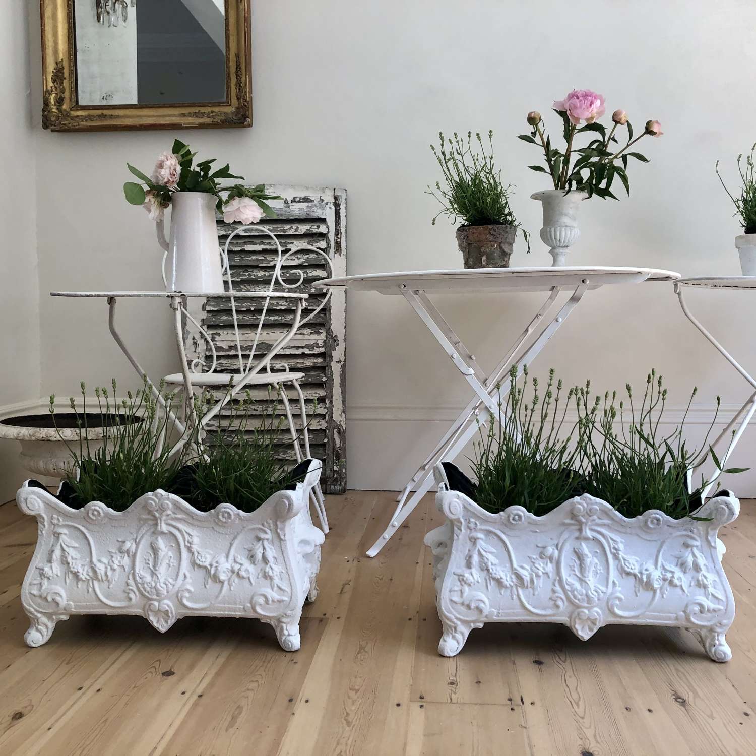 Pair of antique French cast iron planters