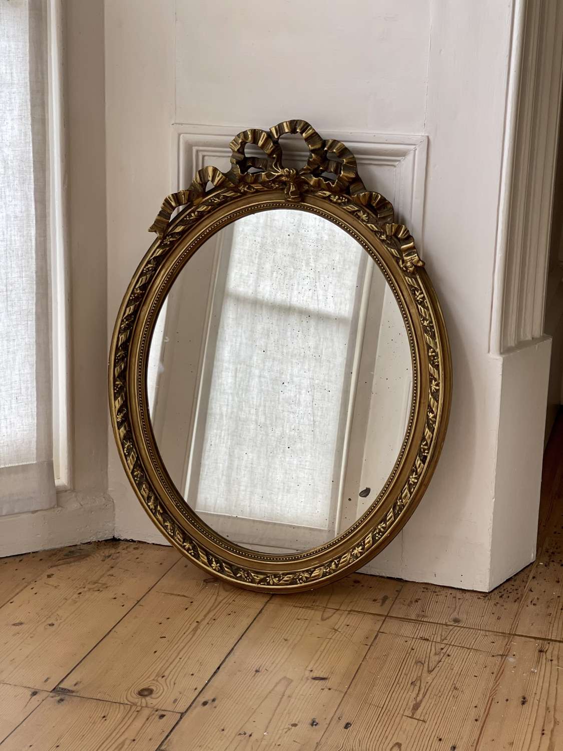 Antique French oval mirror