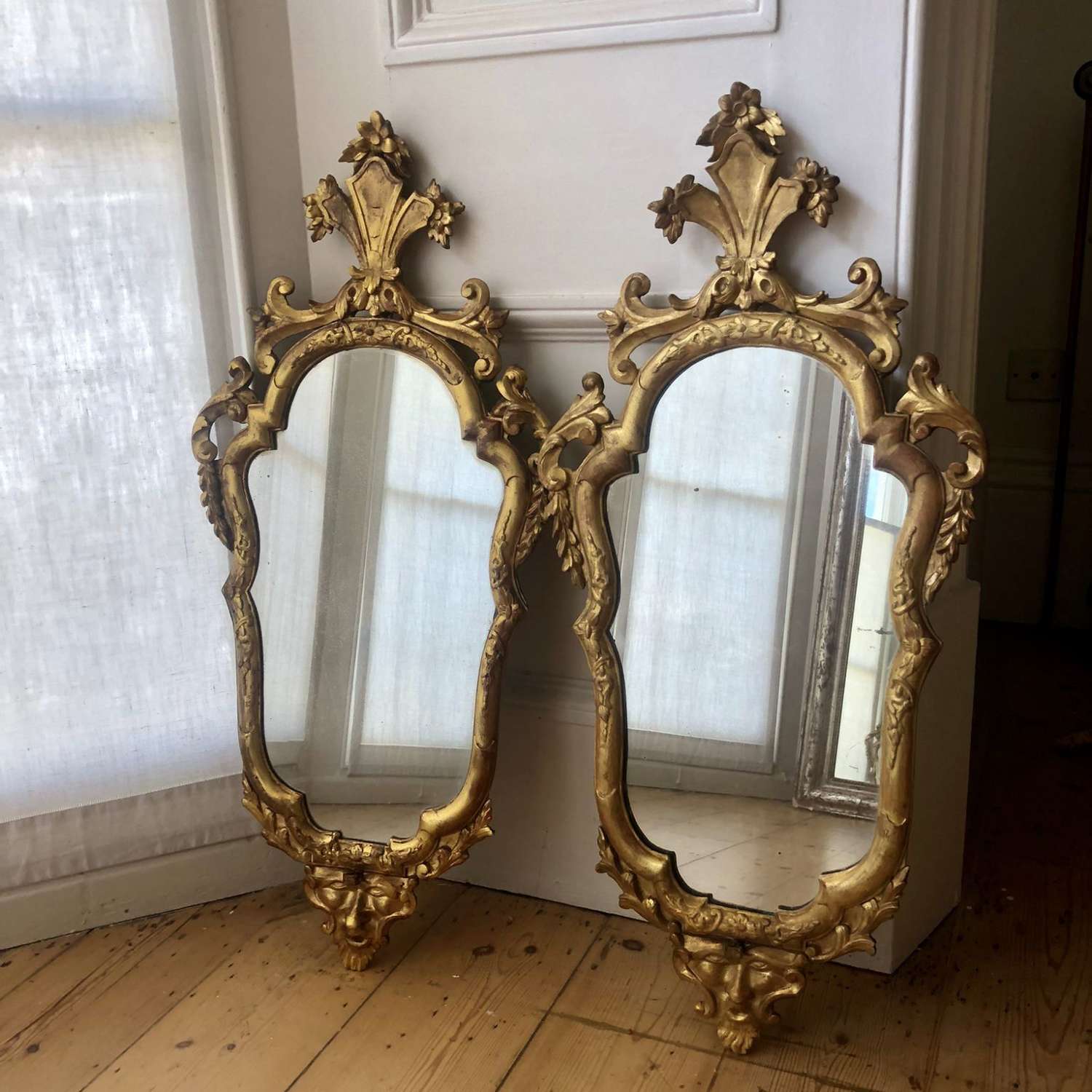 Pair of antique Italian gilt wood mirrors