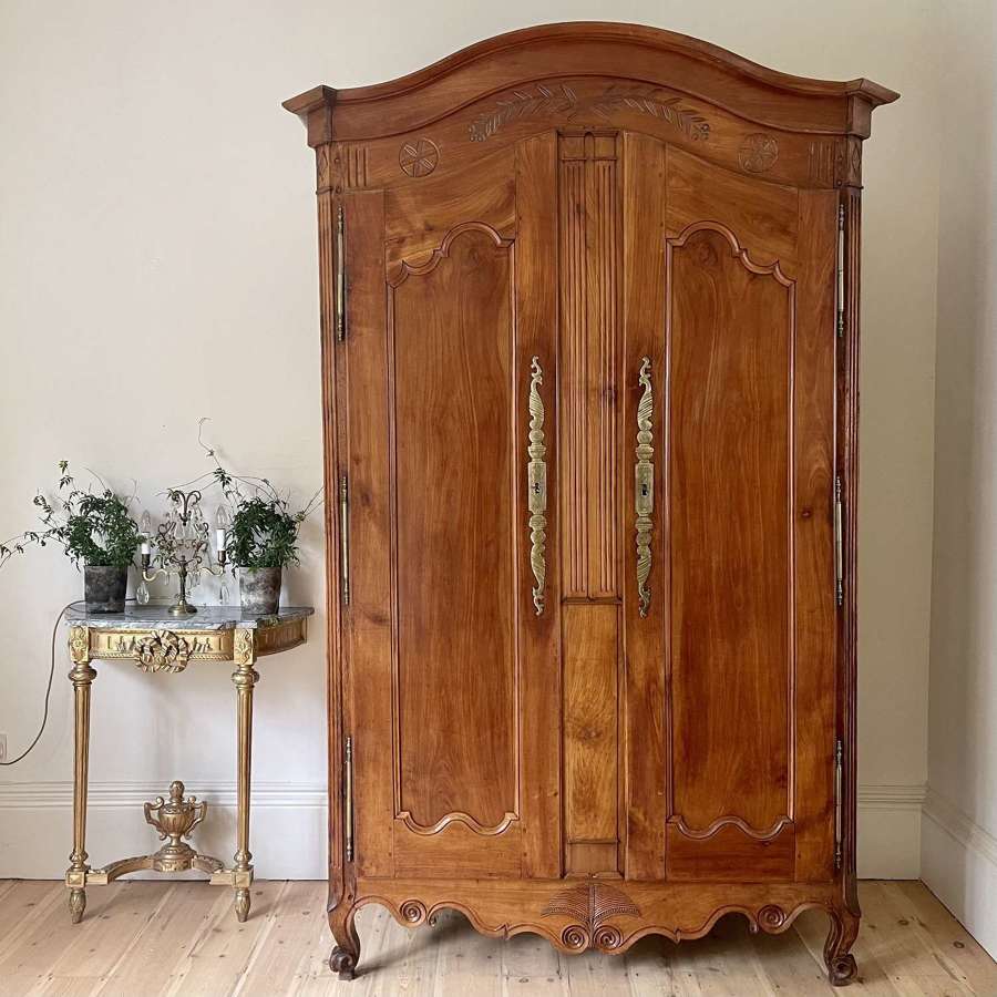 Antique French cherry wood wedding armoire