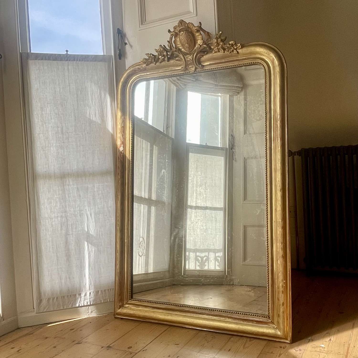 Antique French Louis XV gilt mirror