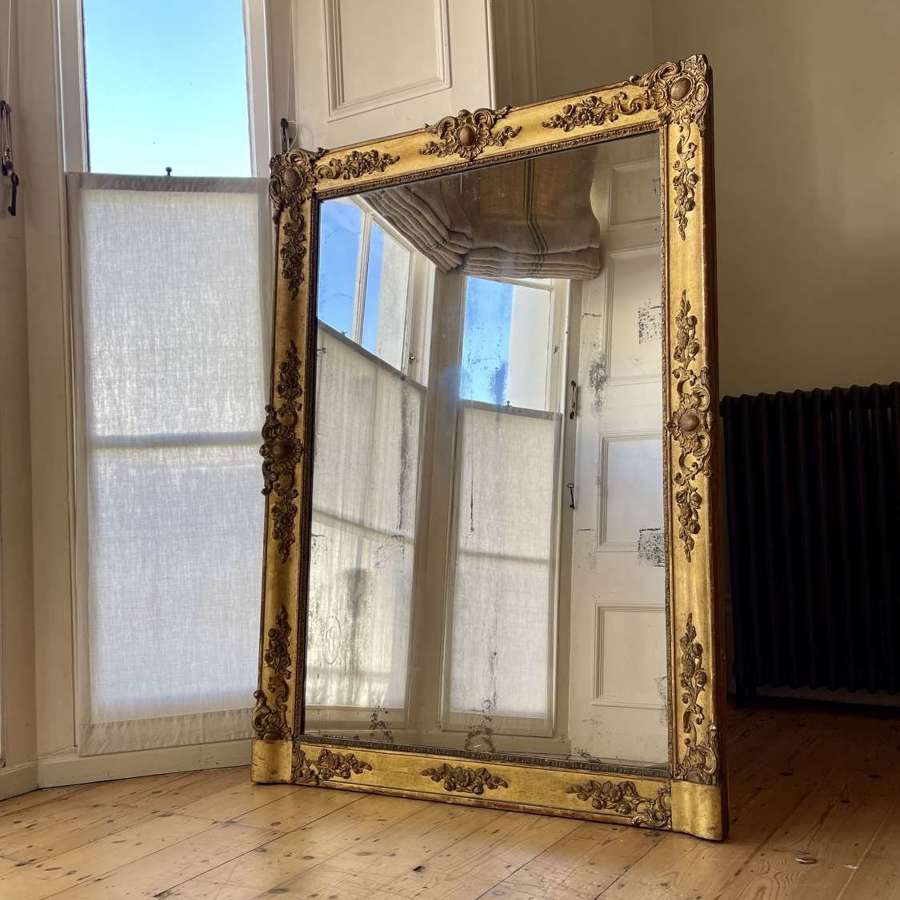 Large antique French gilt leaner mirror