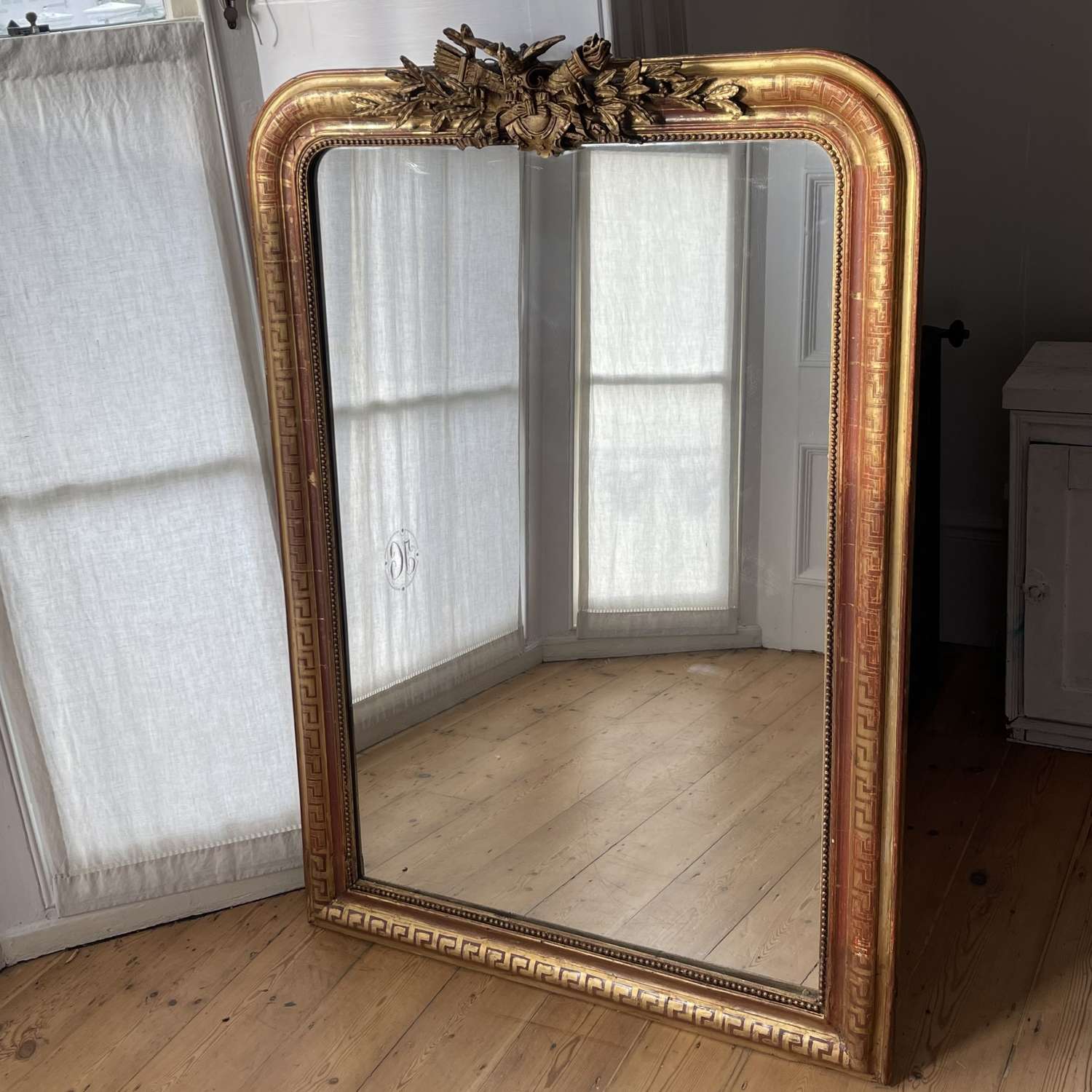 Antique French gilt crested mirror