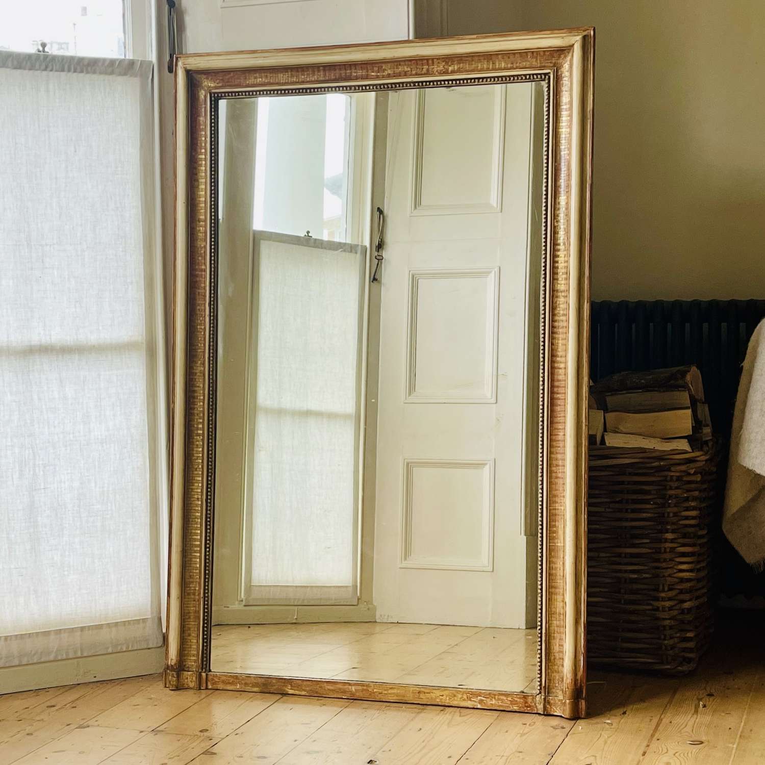 19th century French gilt and bare gesso mirror