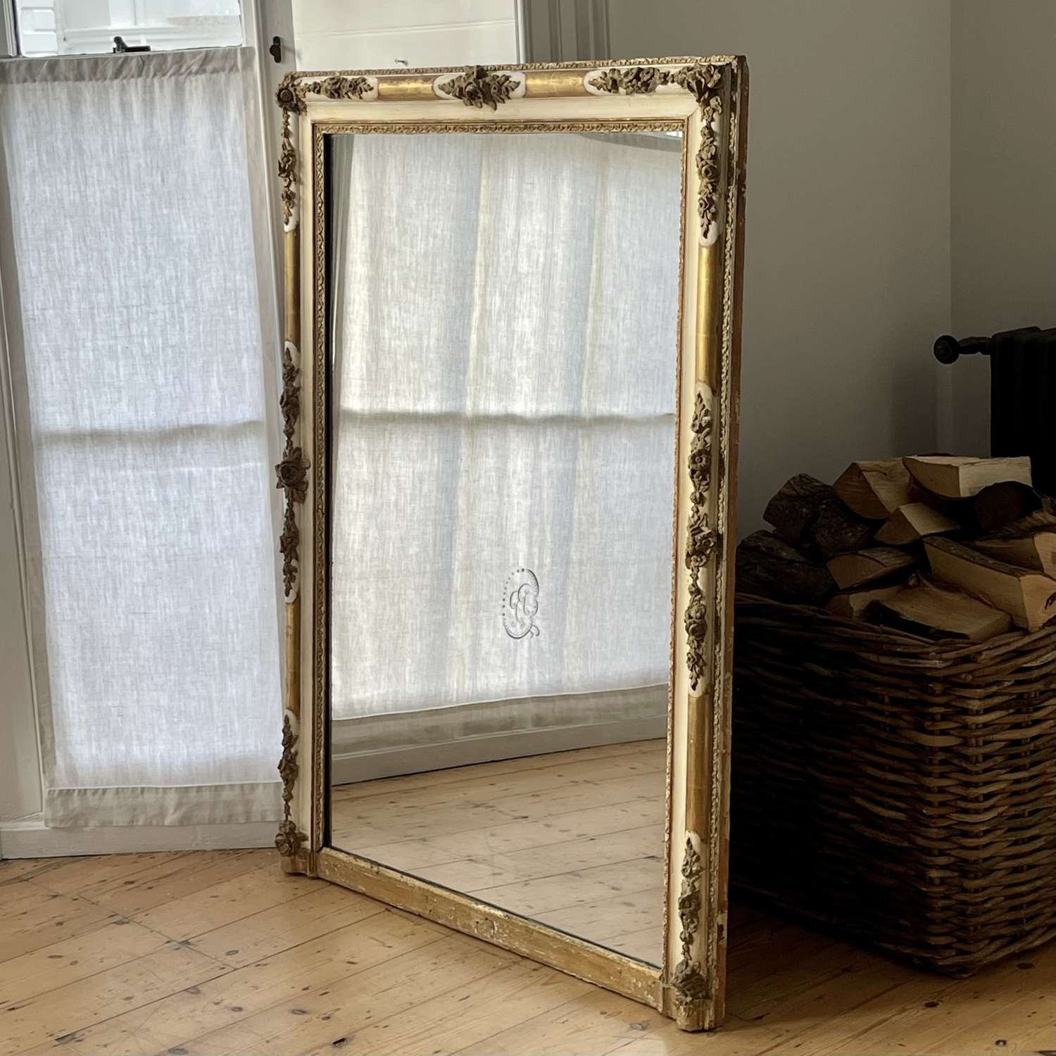 Large French gilt and bare gesso Empire mirror c1830