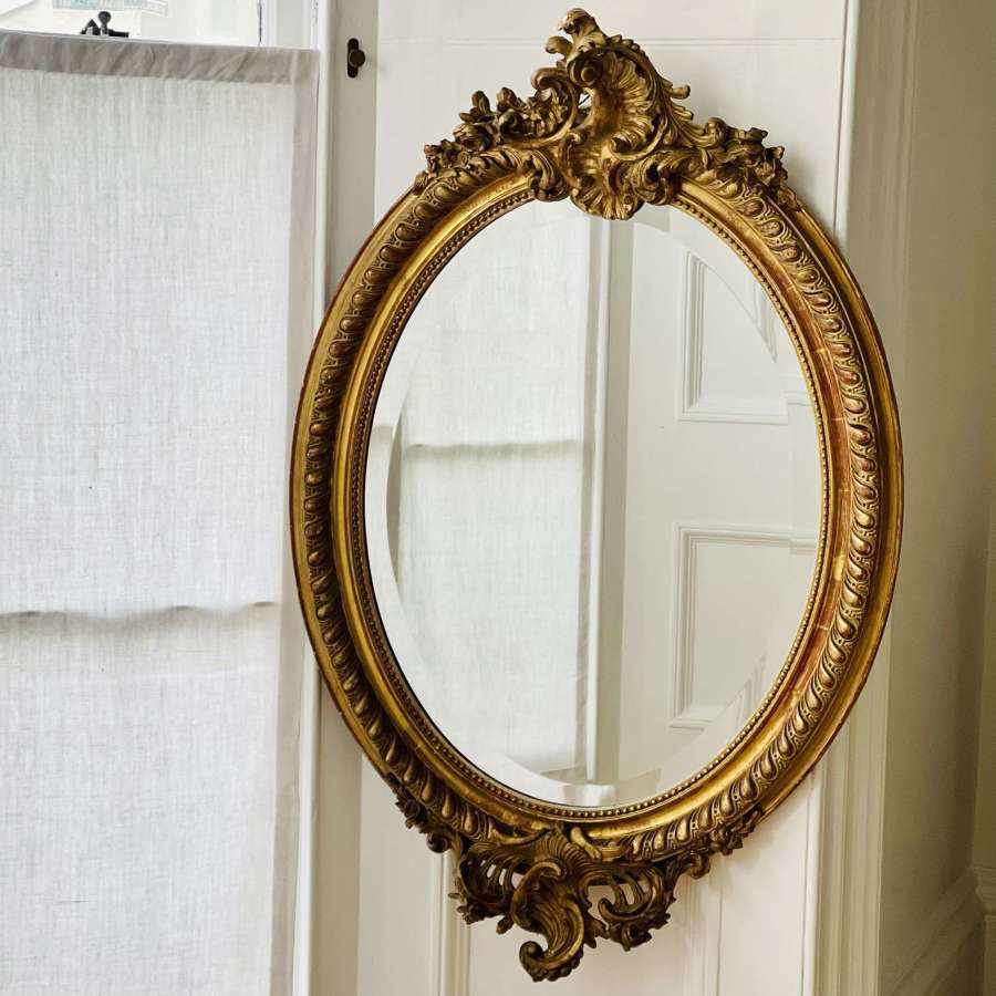 Antique French gilt oval mirror