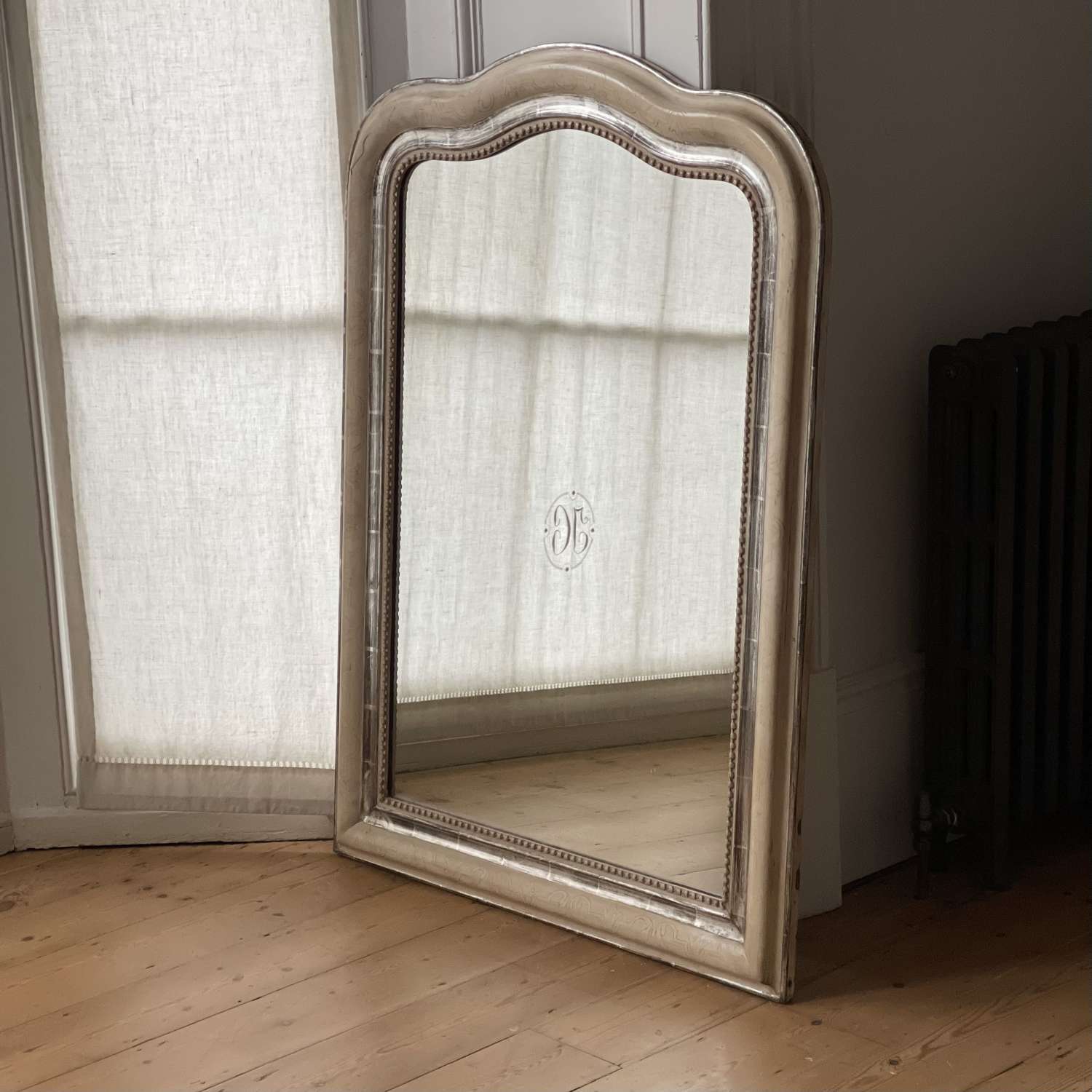 Antique French silver gilt and bare gesso mirror
