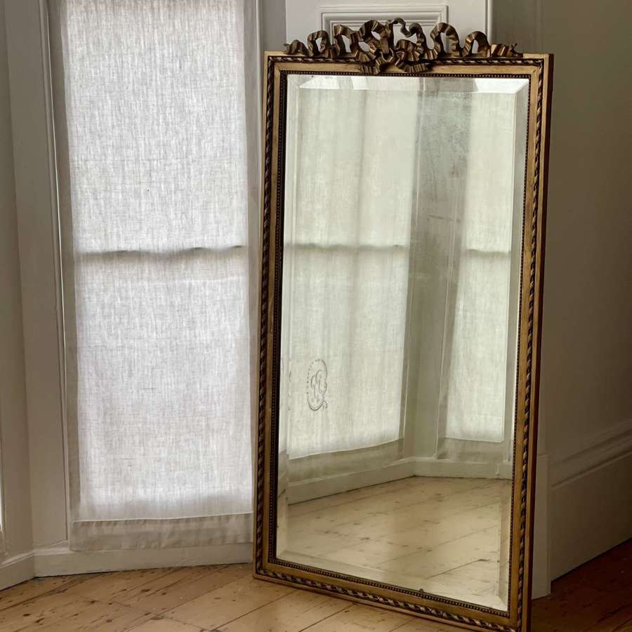 Antique French gilt mirror with bevelled glass