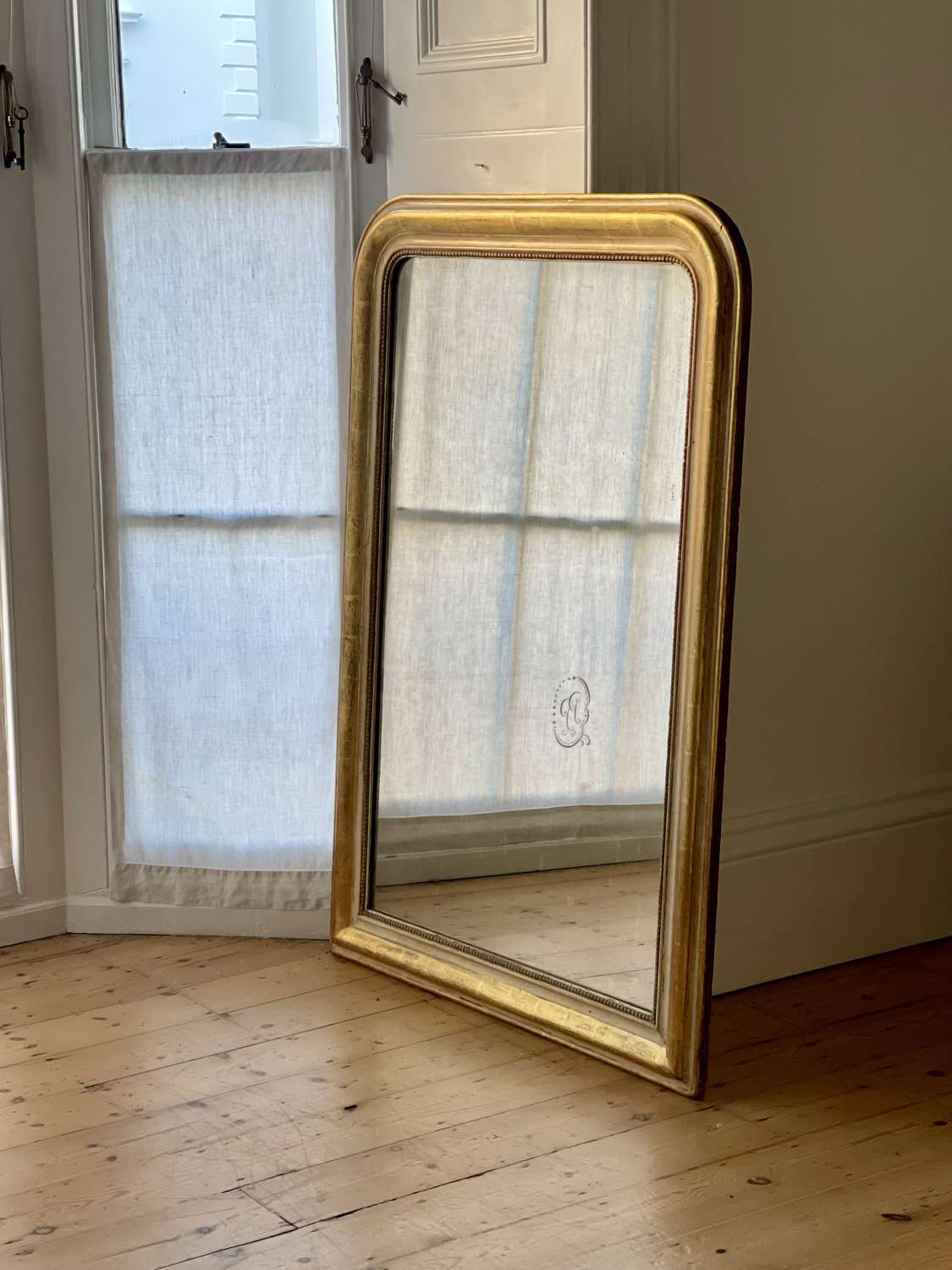 Large antique French gilt mirror