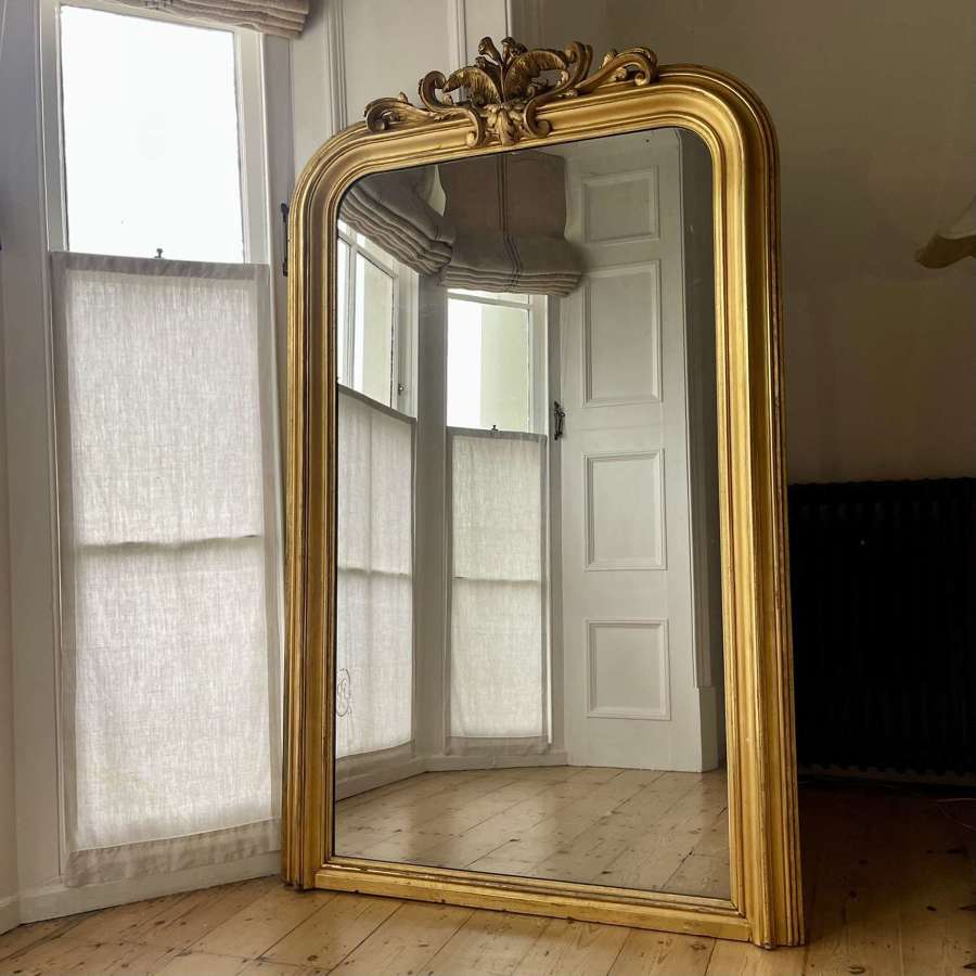 Large antique French gilt Louis XV leaner mirror