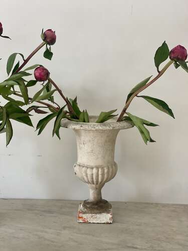 Three antique French cast iron urns