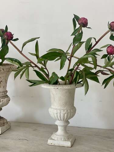 Three antique French cast iron urns