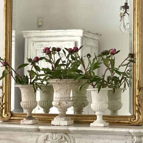 Three antique French cast iron urns