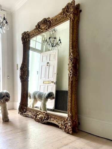 Large antique French gilt wood leaner mirror