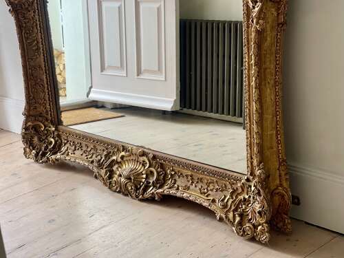 Large antique French gilt wood leaner mirror