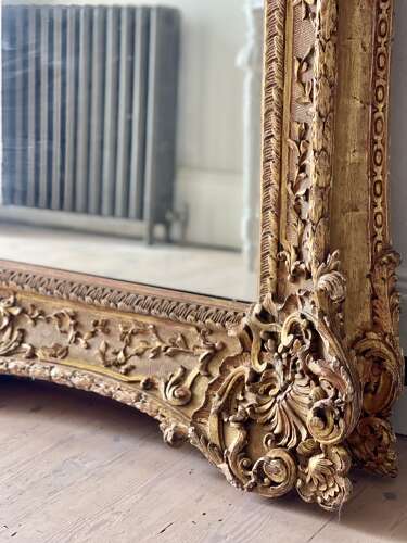 Large antique French gilt wood leaner mirror