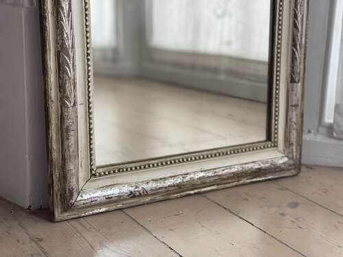 Antique French silver gilt and bare gesso mirror