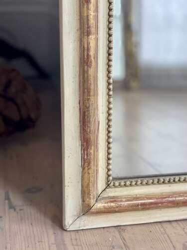 19th century French gilt and bare gesso mirror