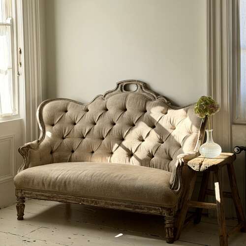 Antique French oak and linen button back sofa