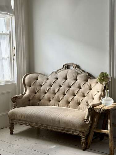 Antique French oak and linen button back sofa