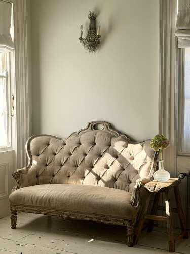 Antique French oak and linen button back sofa