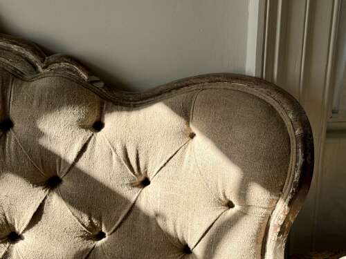 Antique French oak and linen button back sofa
