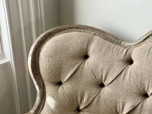 Antique French oak and linen button back sofa