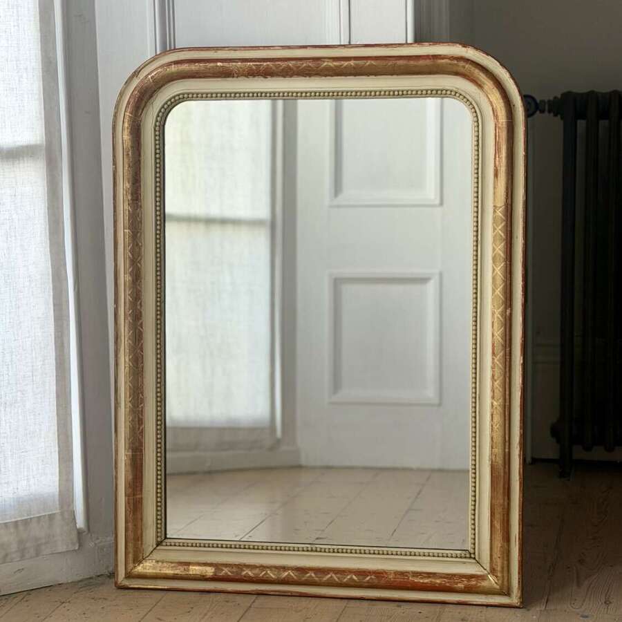 19th century French gilt and bare gesso mirror