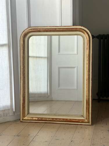 19th century French gilt and bare gesso mirror