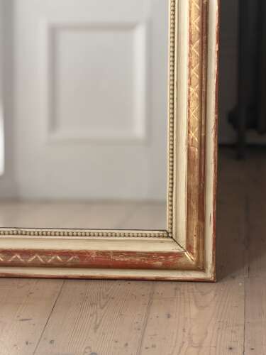 19th century French gilt and bare gesso mirror