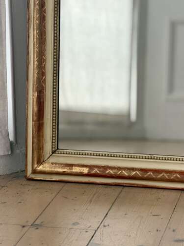 19th century French gilt and bare gesso mirror